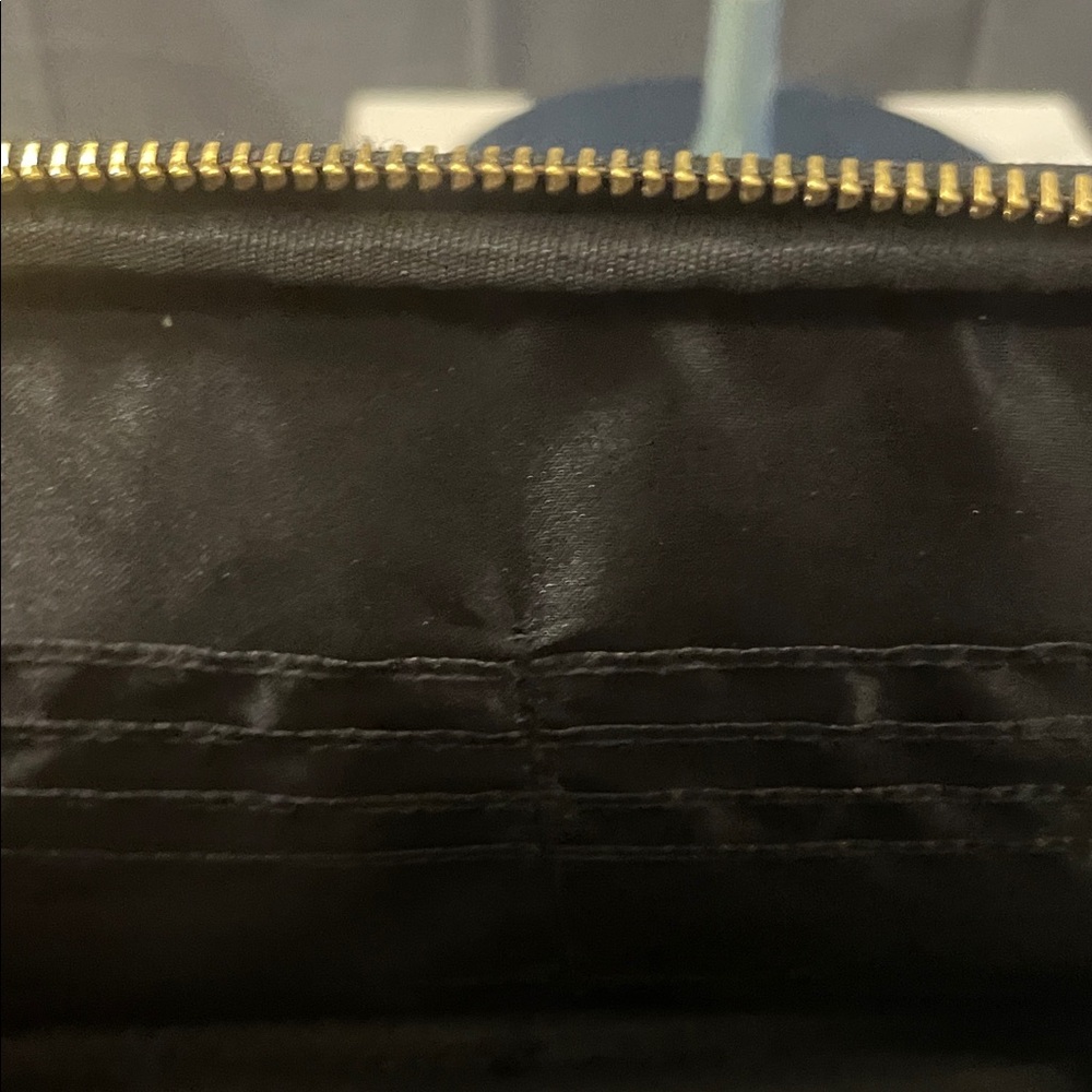 Elegant Black Crossbody Bag with Gold Accents - Picture 10 of 11
